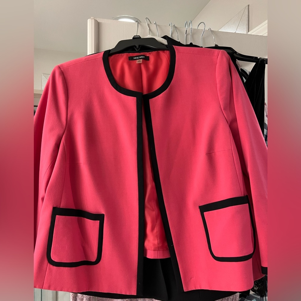 Pink with black trim suit jacket